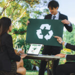 Group of businesspeople meeting at outdoor office with recycle. Gyre