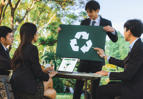 Group of businesspeople meeting at outdoor office with recycle. Gyre